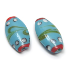 Lampwork stiklas ovalinis melsvas 27 mm
