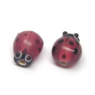 Lampwork boružėlė pusiau skaidri alyvinės spalvos 13x10 mm
